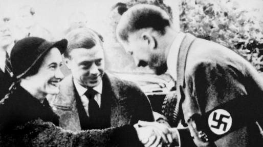 File photo dated 23/10/1937 of the Duke and Duchess of Windsor meeting with German leader Adolf Hitler in Munich as Buckingham Palace has defended footage from 1933 that shows a young Queen performing a Nazi salute with her family at Balmoral.. Issue date: Friday July 17, 2015. The film, obtained by The Sun, shows the Queen, then aged six or seven, join the Queen Mother and her uncle Prince Edward, the Prince of Wales, in raising an arm in salute as she played alongside her younger sister, Princess Margaret. See PA story ROYAL Queen. Photo credit should read: PA Wire
